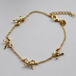 Curve Bow Armband Gylt Silvur